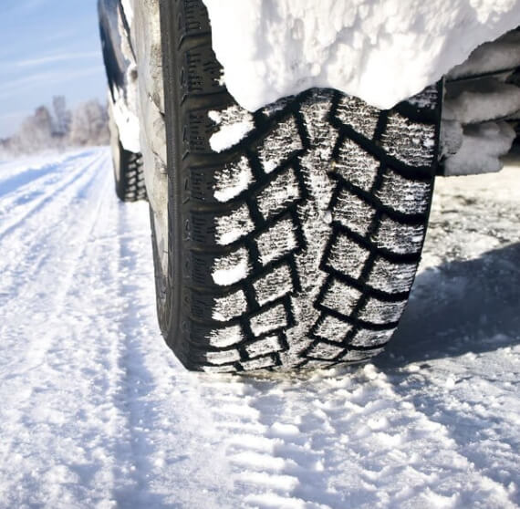 Variety of winter tires for cars, SUVs, and trucks displayed at The Tire Studio